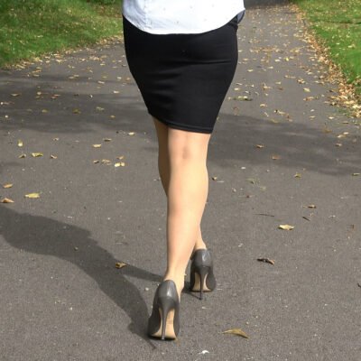 lovely walking tottering in high heels