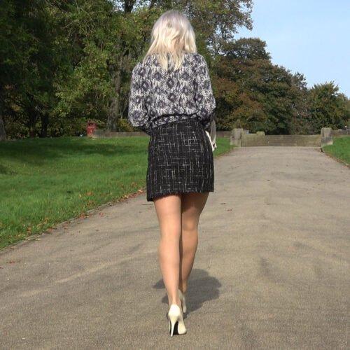 Tottering in White Essex Girl heels