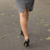 tottering along in high heels