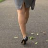 tottering along in high heels