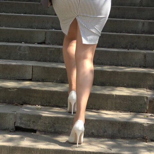 wearing lovely creamy white high heels