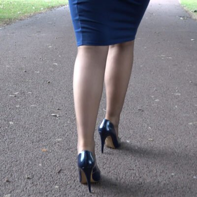 her high heeled hips are swaying